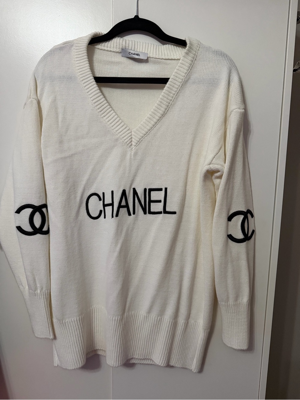 CHANEL Cream V-Neck Logo Knit Sweater with Black Accents